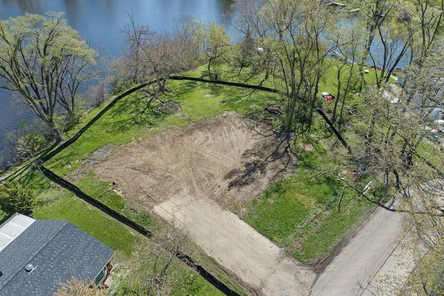 a view of a pathway both side of green field