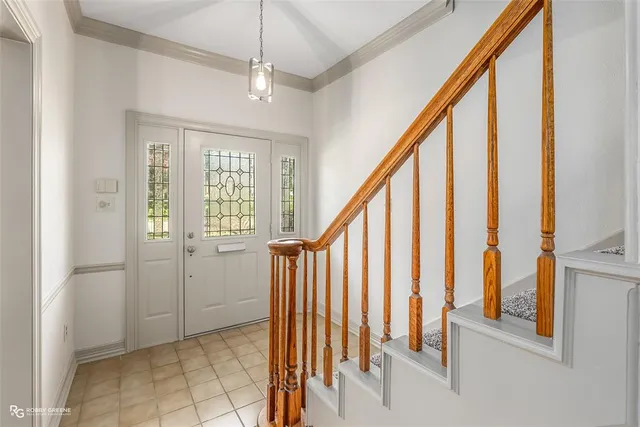 a view of an entryway with staircase
