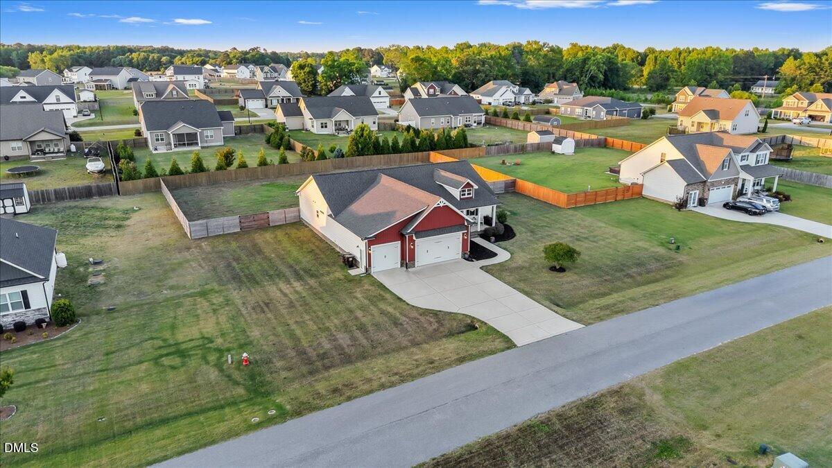 88 Heath Road Lillington, NC 27546 - Photo 52 of 54 an aerial view of a houses with a big yard