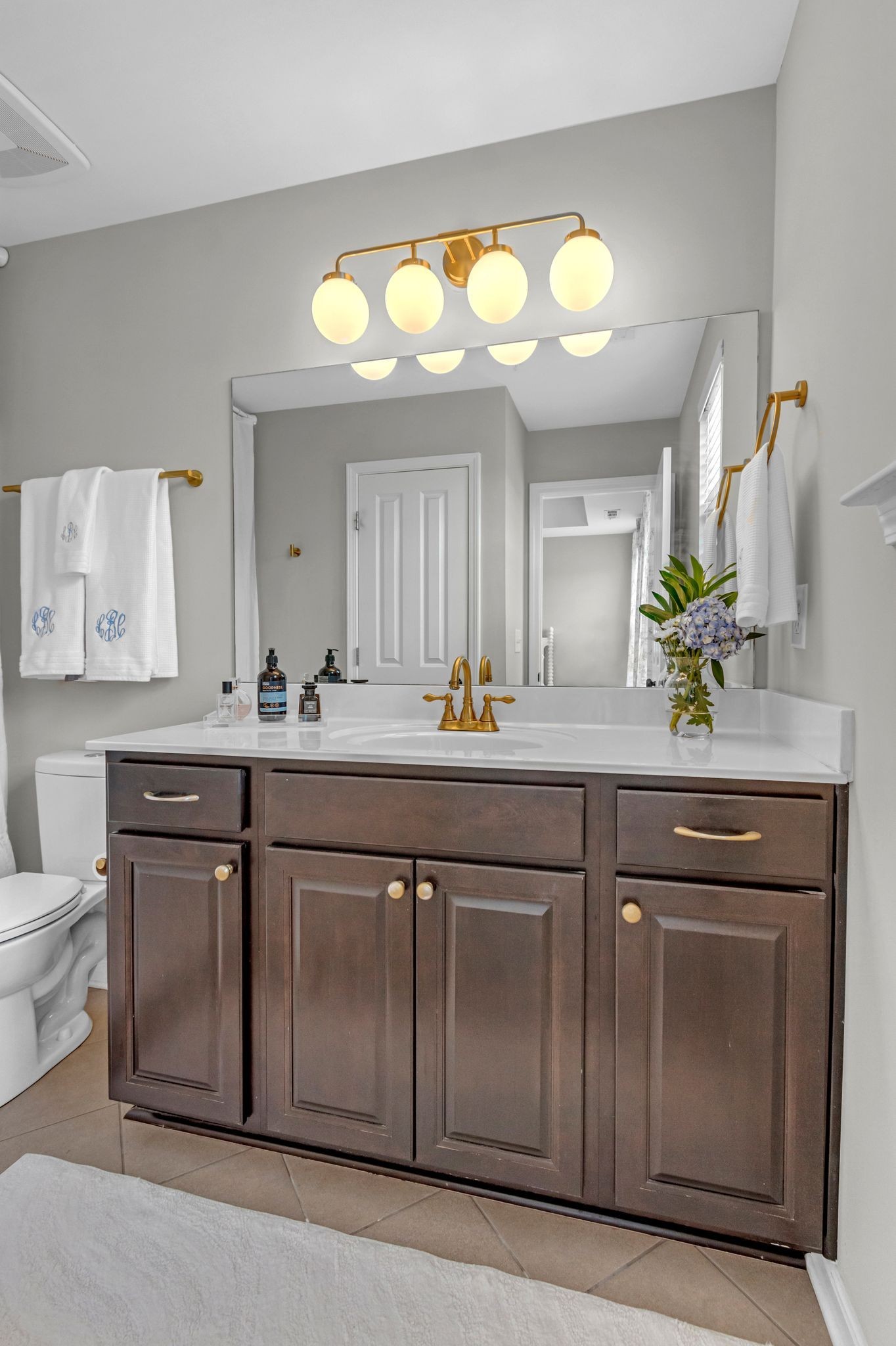 307 Oldbury Lane Spring Hill, TN 37174 - Photo 14 of 23 a bathroom with a sink and a mirror
