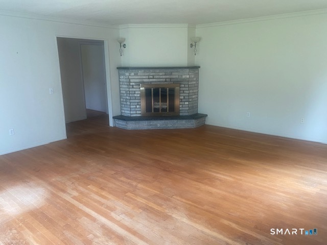107 Tower Road Brookfield, CT 06804 - Photo 5 of 19 a view of empty room with a fireplace