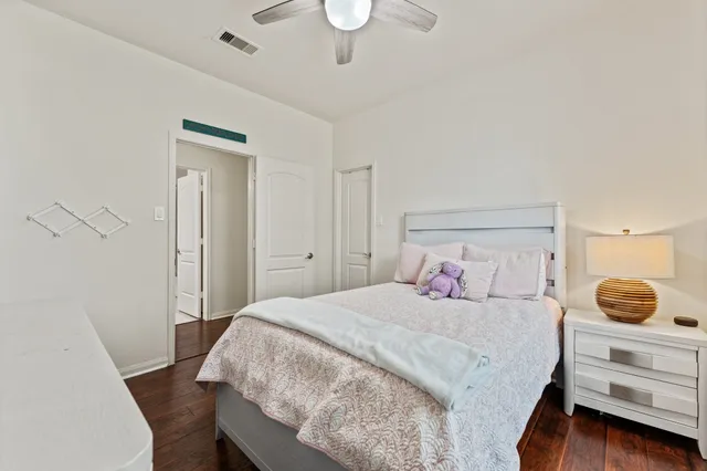 a bedroom with a bed and a cabinets