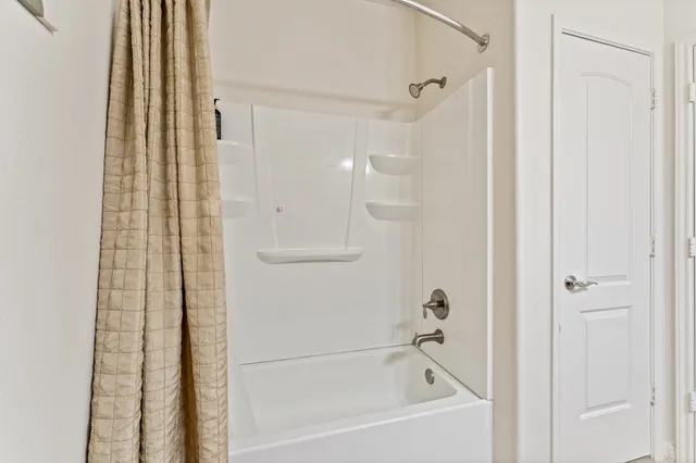 a bathroom with a bathtub