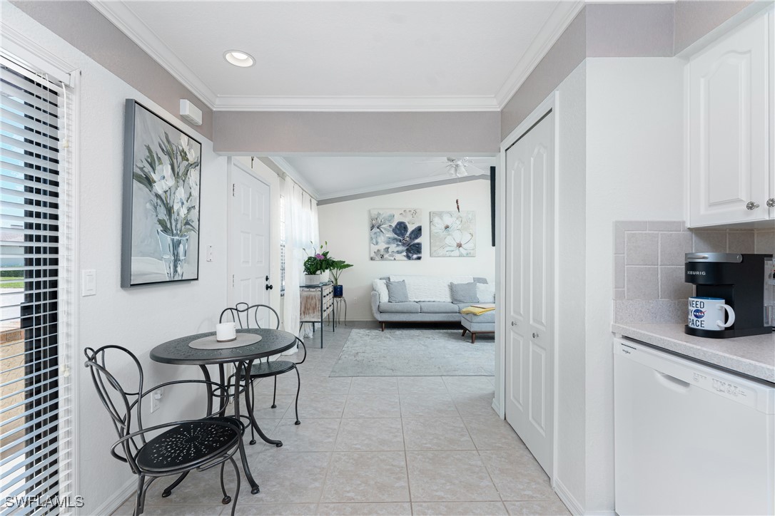 13100 South McCall Road, Unit 112 Port Charlotte, FL 33981 - Photo 13 of 45 a view of a livingroom with furniture and bedroom