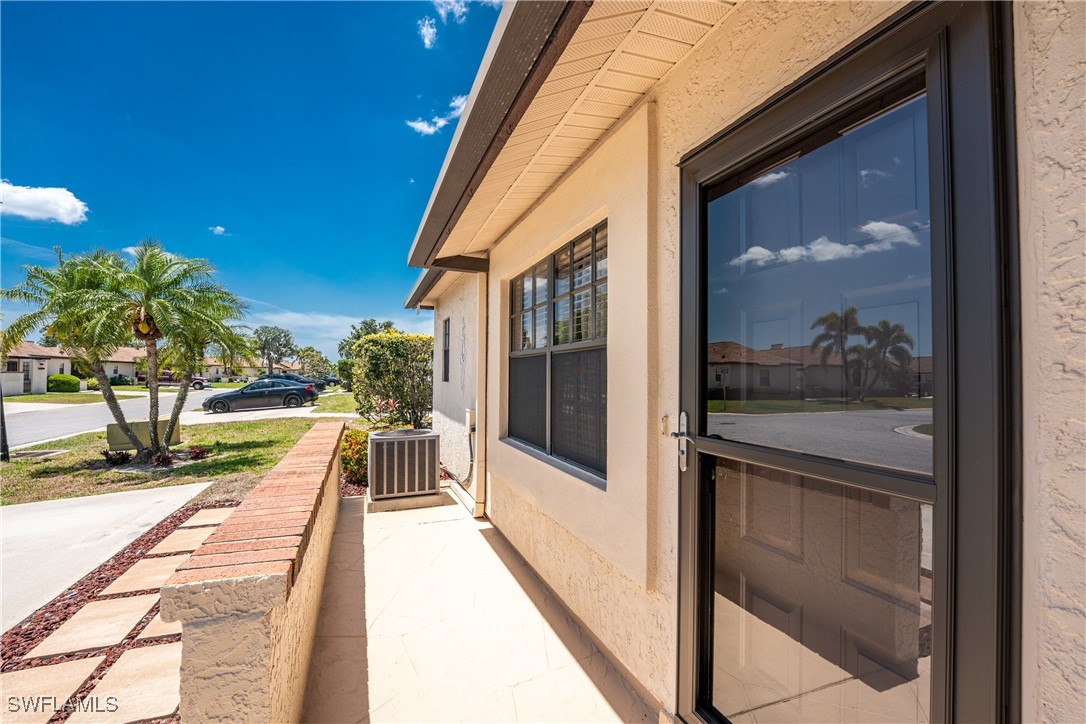 13100 South McCall Road, Unit 112 Port Charlotte, FL 33981 - Photo 29 of 45 a view of a balcony with a potted plant