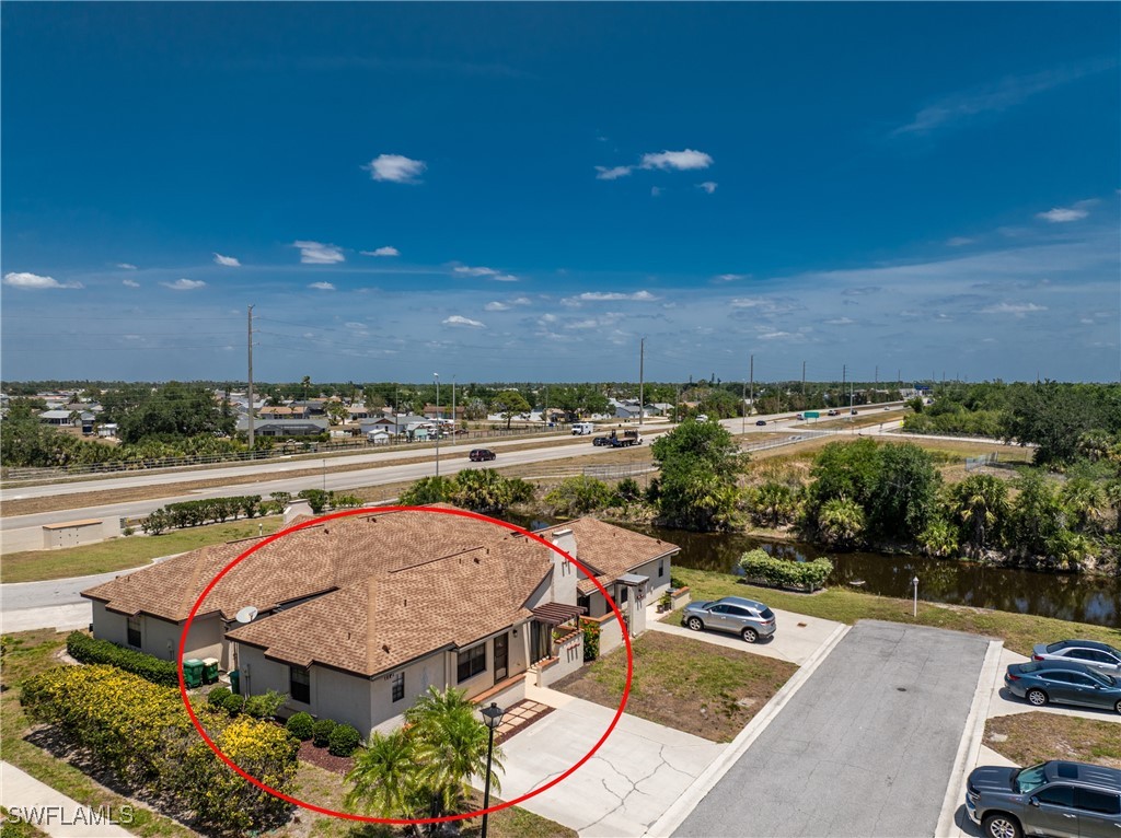 13100 South McCall Road, Unit 112 Port Charlotte, FL 33981 - Photo 34 of 45 an aerial view of a house with a lake view