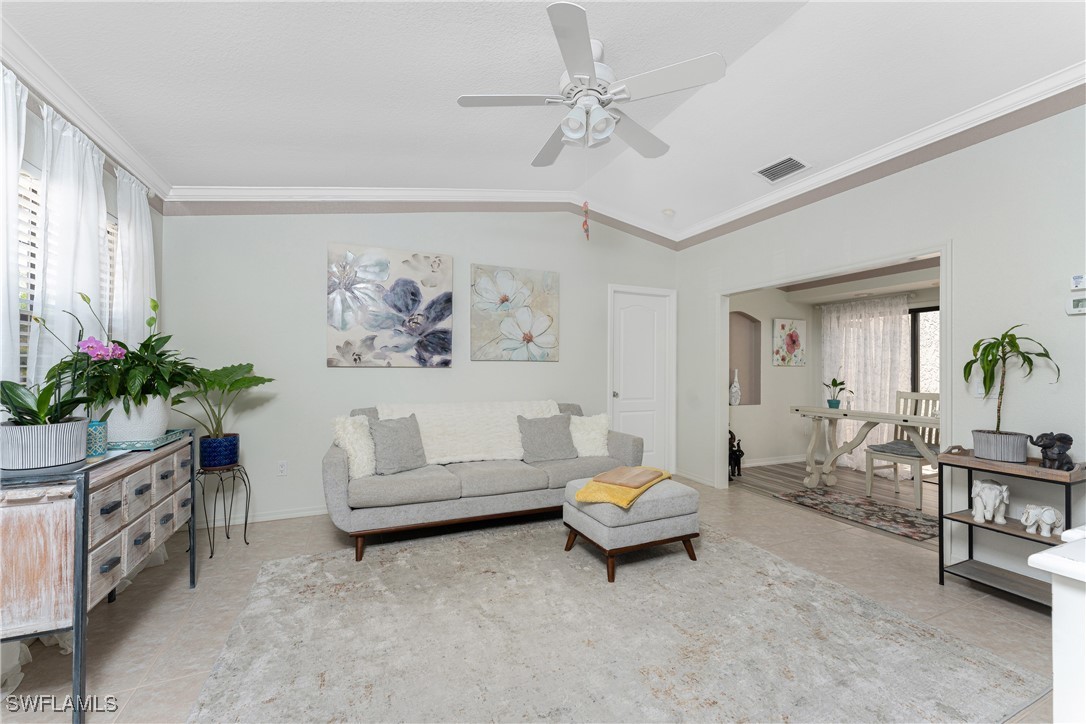 13100 South McCall Road, Unit 112 Port Charlotte, FL 33981 - Photo 4 of 45 a living room with furniture and a potted plant