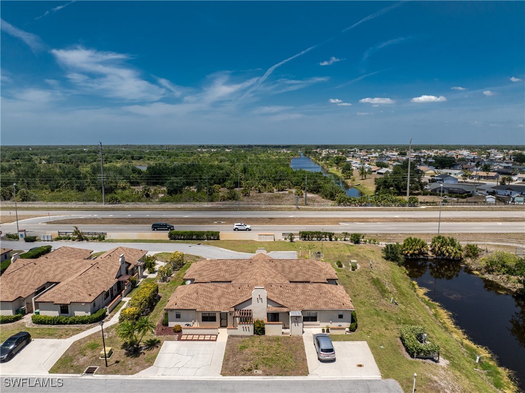 13100 South McCall Road, Unit 112 Port Charlotte, FL 33981 - Photo 41 of 45 a view of a swimming pool with an outdoor seating