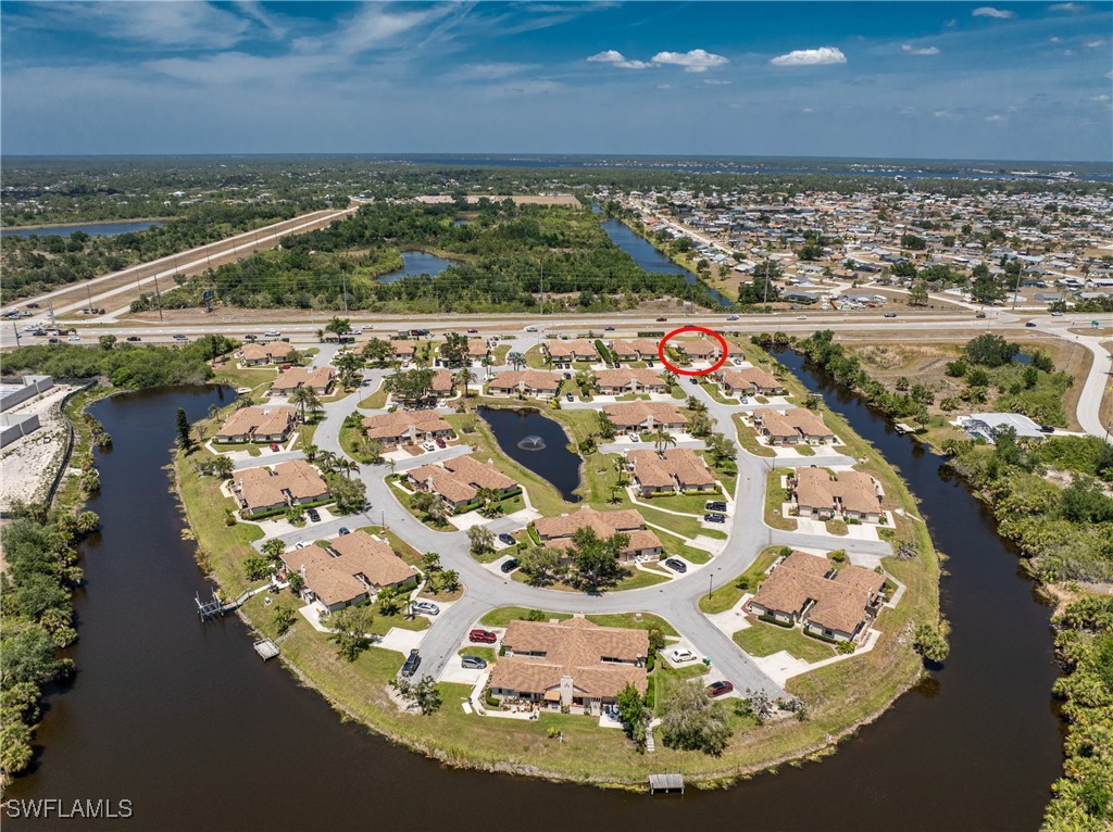 13100 South McCall Road, Unit 112 Port Charlotte, FL 33981 - Photo 43 of 45 an aerial view of a house