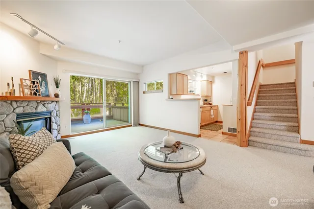 a view of two chairs in the balcony