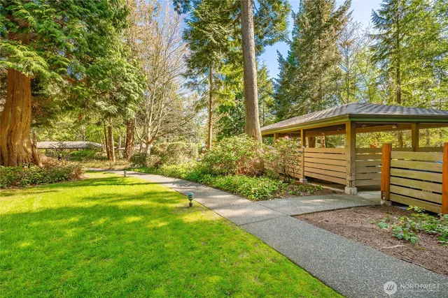 a view of street with houses and trees