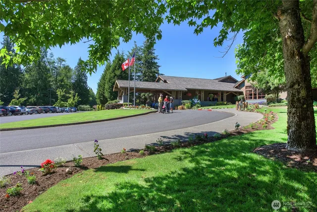 a view of a lake with a yard