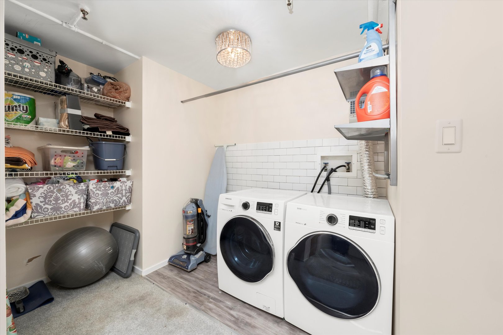 1601 South Michigan Avenue, Unit 108 Chicago, IL 60616 - Photo 17 of 36 a view of livingroom with washer and dryer