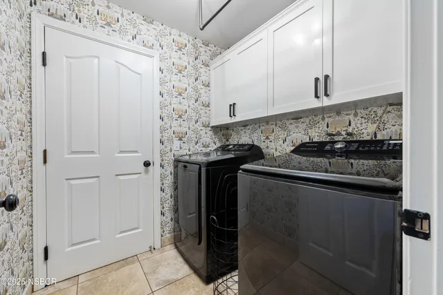 a kitchen with granite countertop a stove and a refrigerator