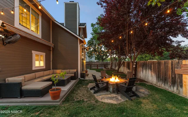 a backyard of a house with seating space