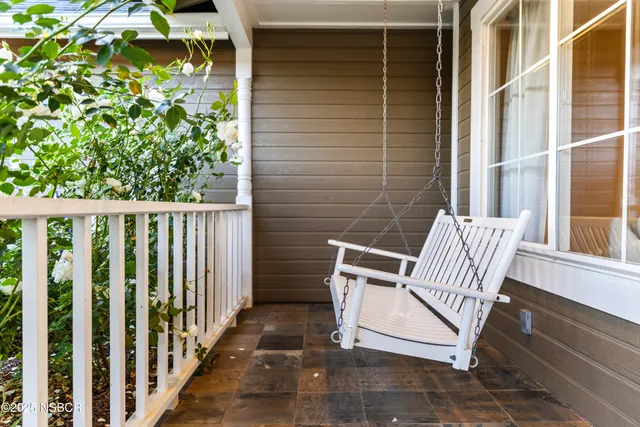 a view of a porch with a bench