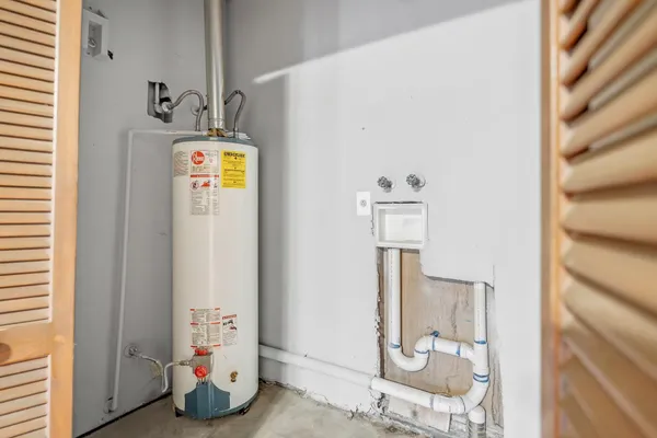 a view of a house with backyard and a garden