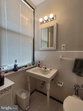 a bathroom with a sink and a toilet