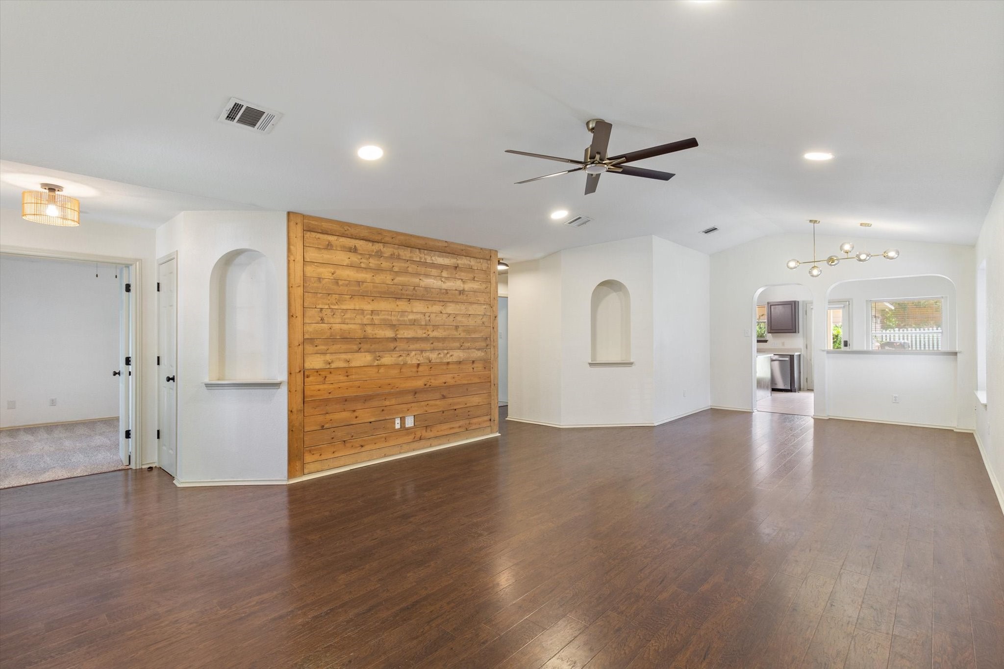 4500 Mather Kyle, TX 78640 - Photo 2 of 14 a view of an empty room with a window and wooden floor