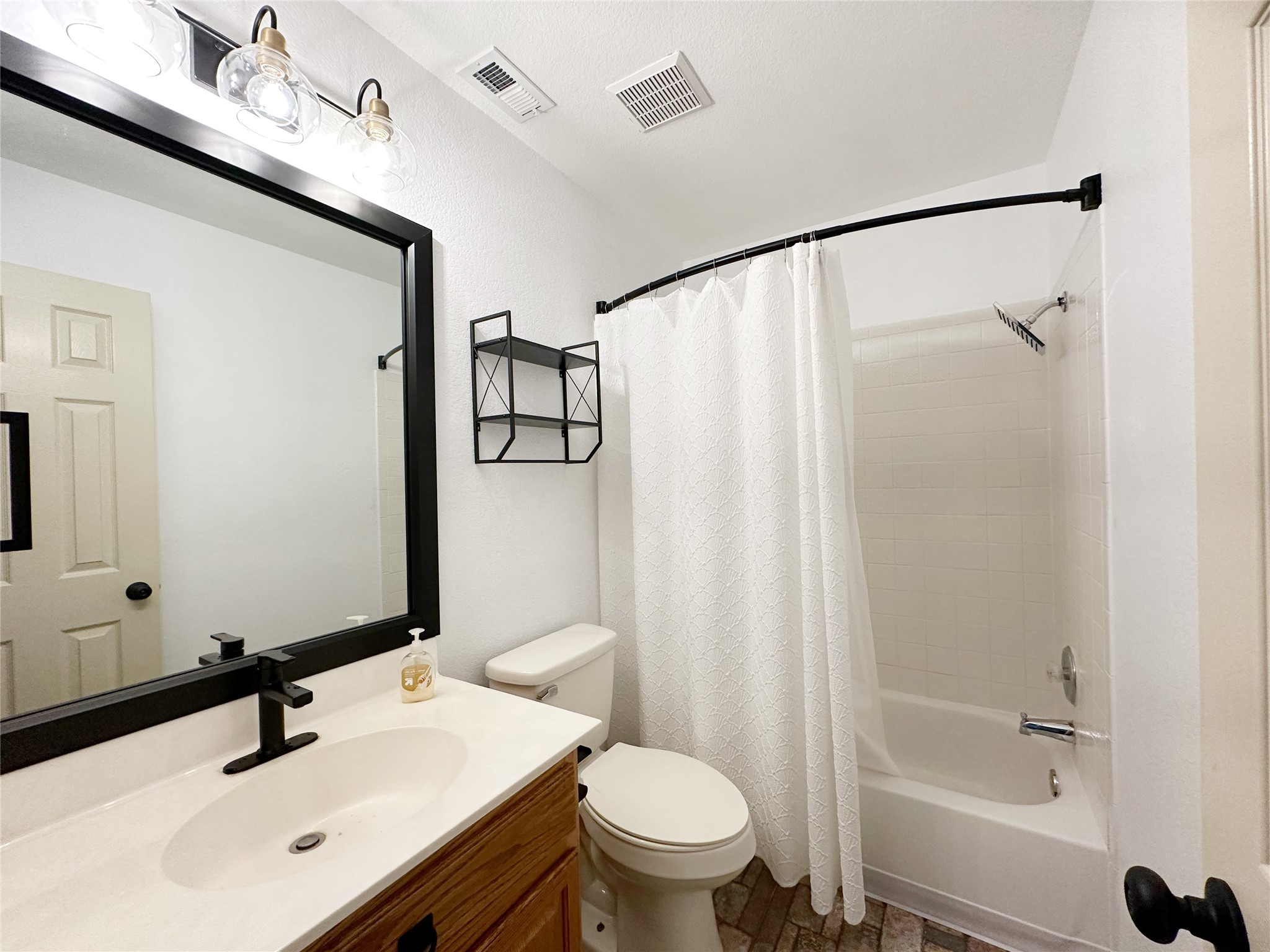4500 Mather Kyle, TX 78640 - Photo 8 of 14 a bathroom with a sink toilet and shower