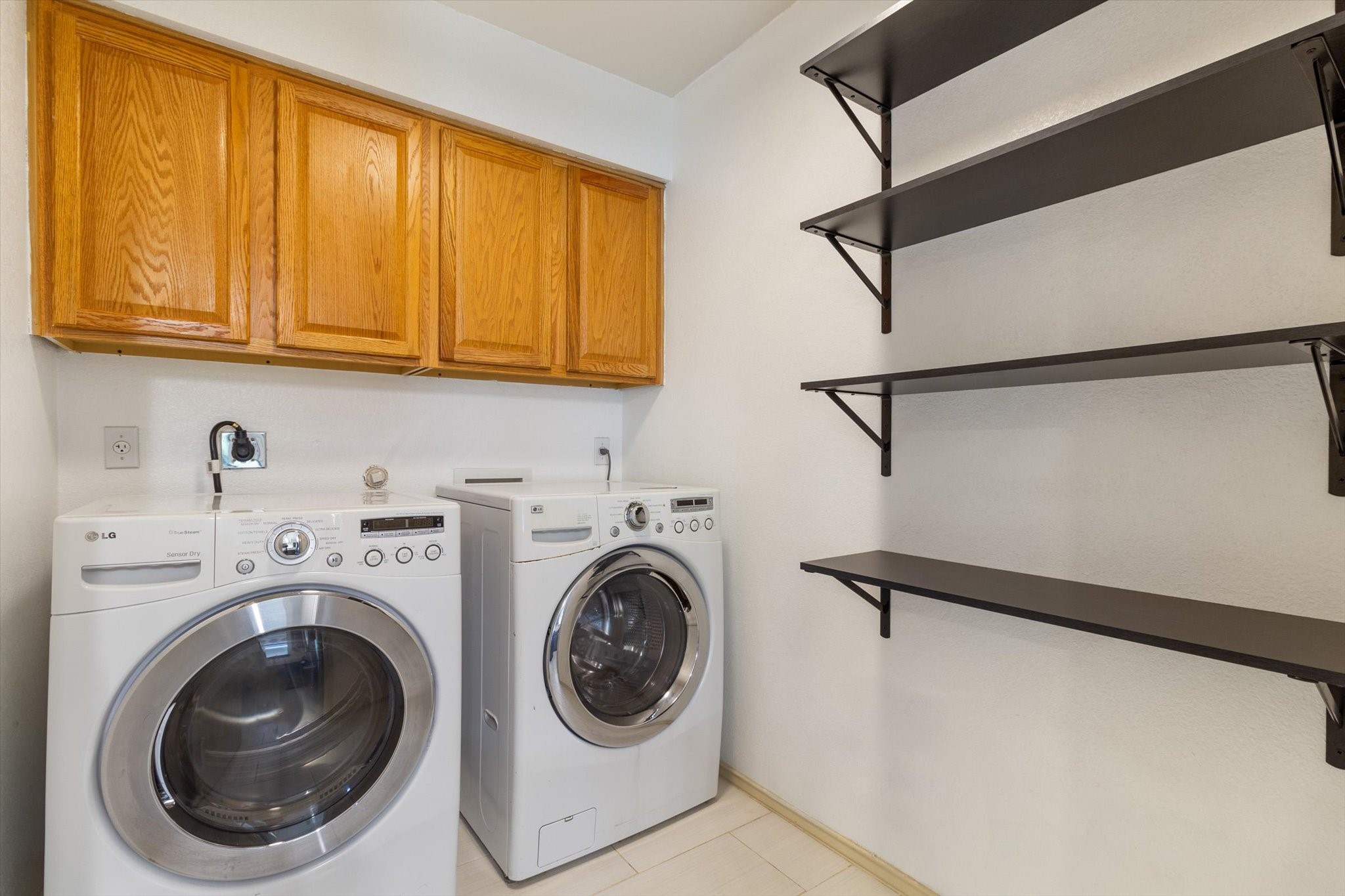 4500 Mather Kyle, TX 78640 - Photo 9 of 14 a utility room with dryer and washer