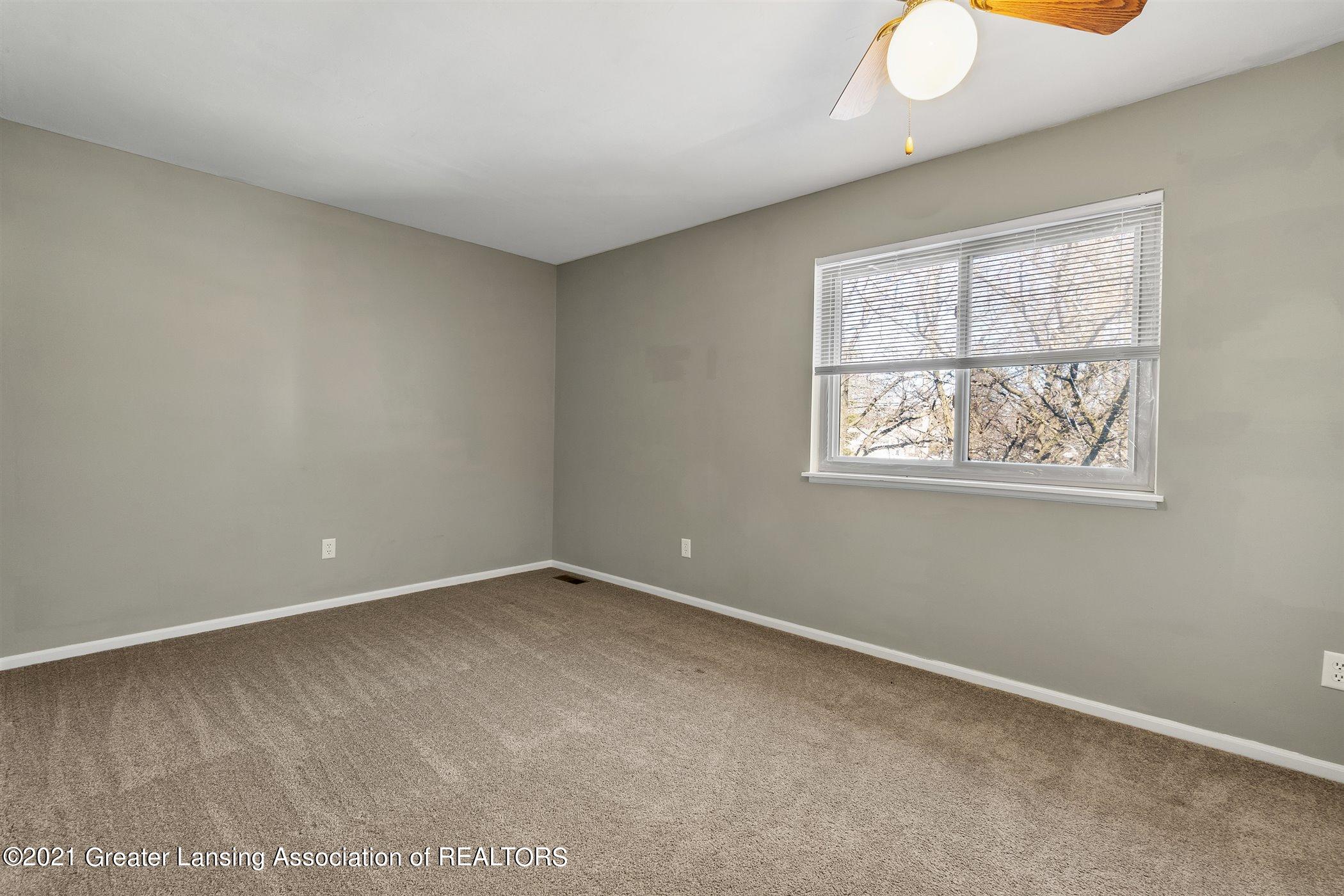 860 Armstrong Road, Unit 5 Lansing, MI 48911 - Photo 22 of 35 SECOND BEDROOM