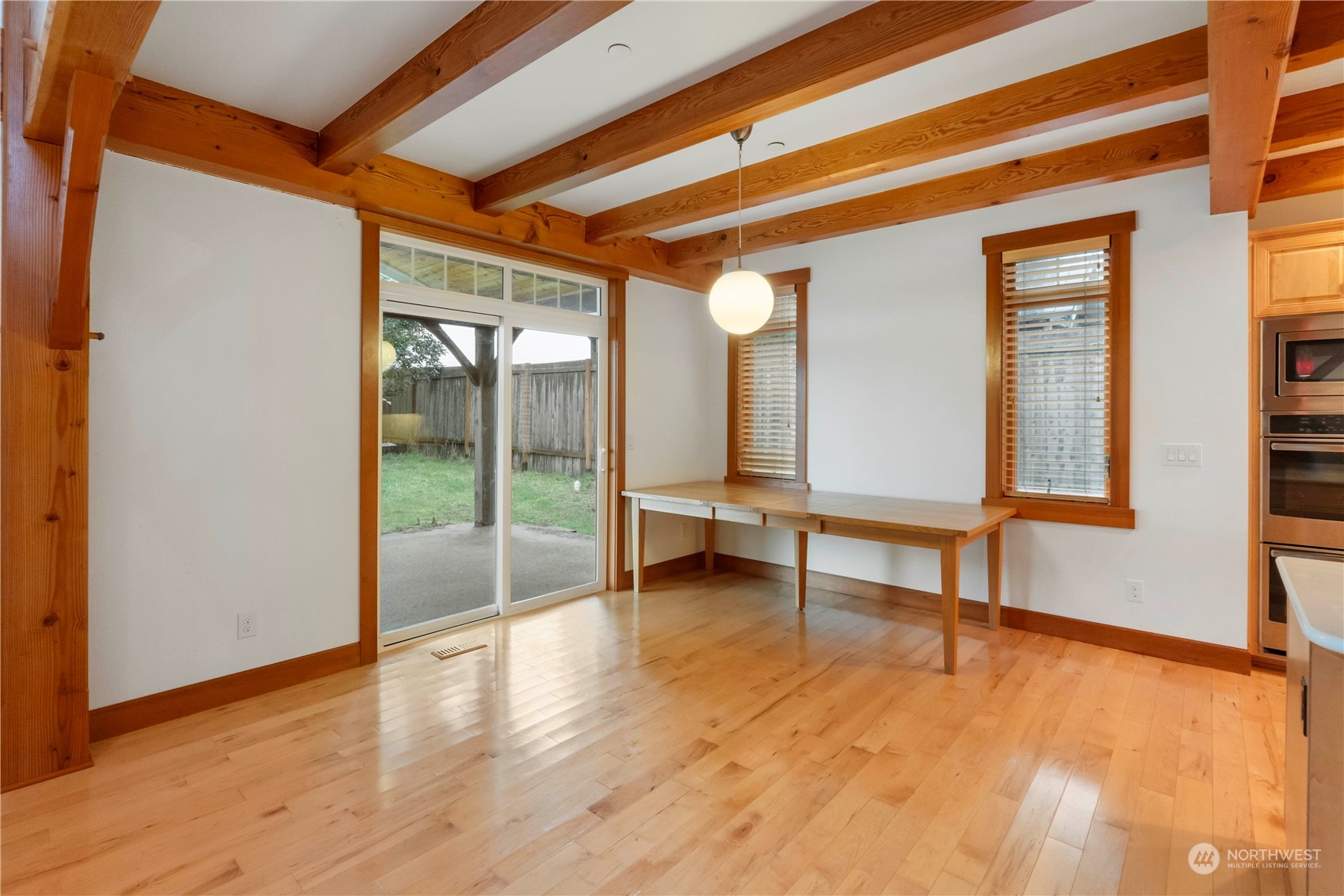 73 Raft Island Drive Northwest Gig Harbor, WA 98335 - Photo 14 of 40 a view of an empty room with wooden floor and a window