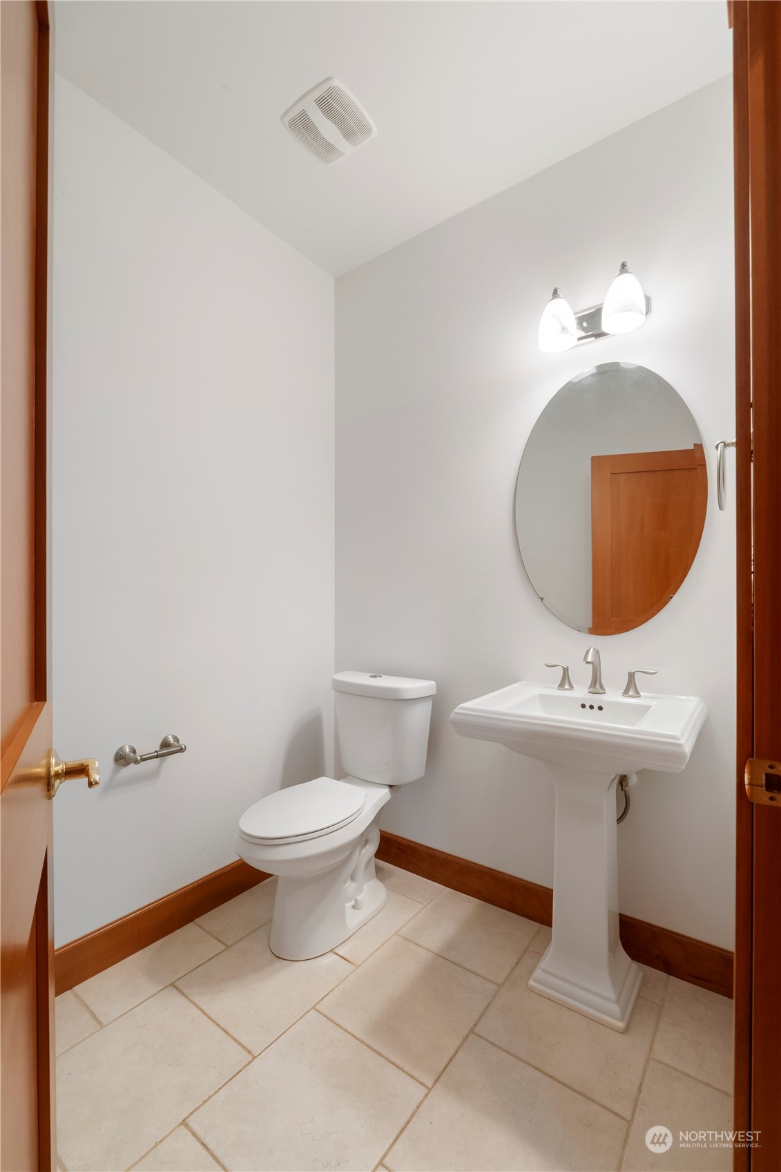 73 Raft Island Drive Northwest Gig Harbor, WA 98335 - Photo 17 of 40 a bathroom with a sink toilet and a mirror