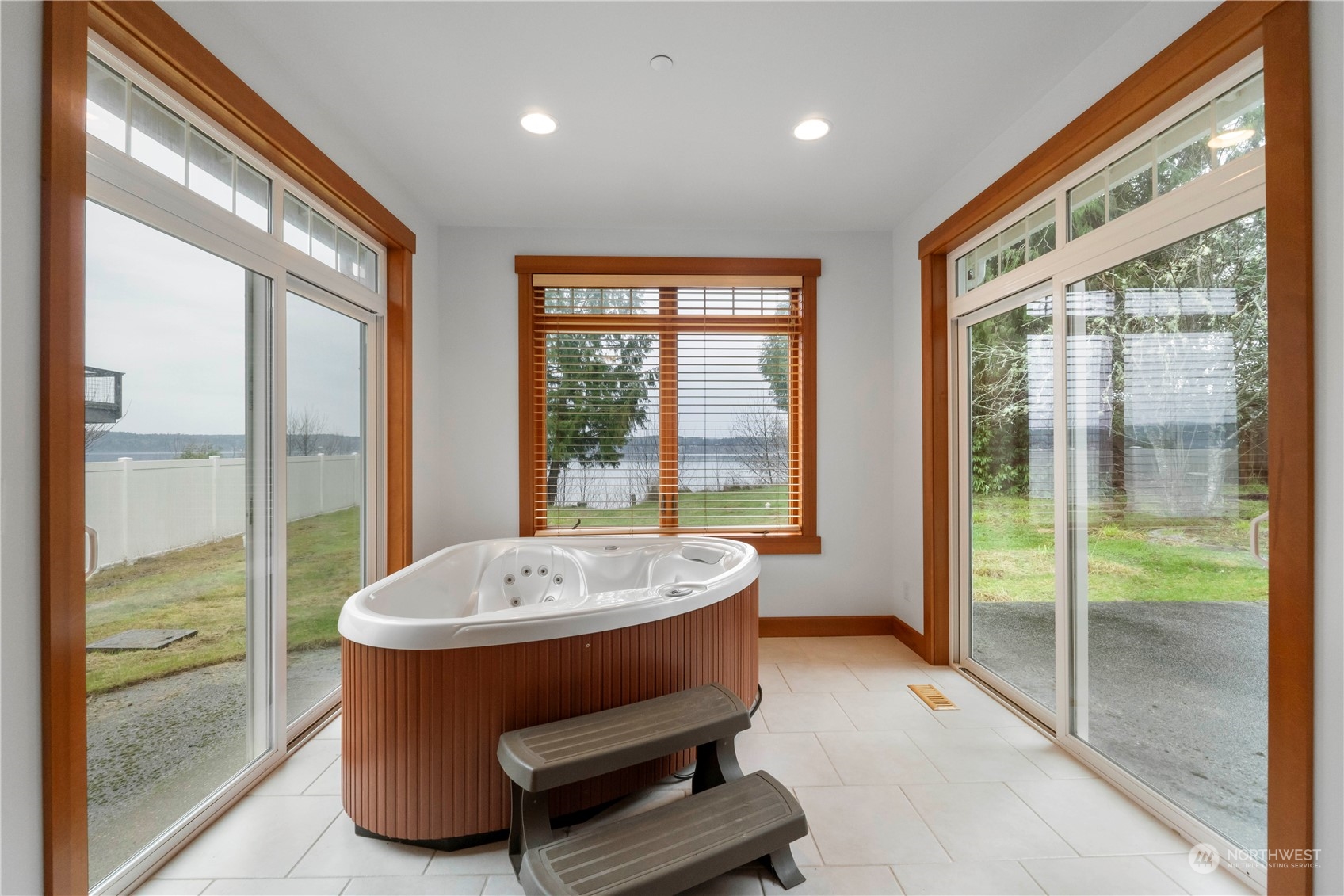 73 Raft Island Drive Northwest Gig Harbor, WA 98335 - Photo 20 of 40 a room with pool table and glass door