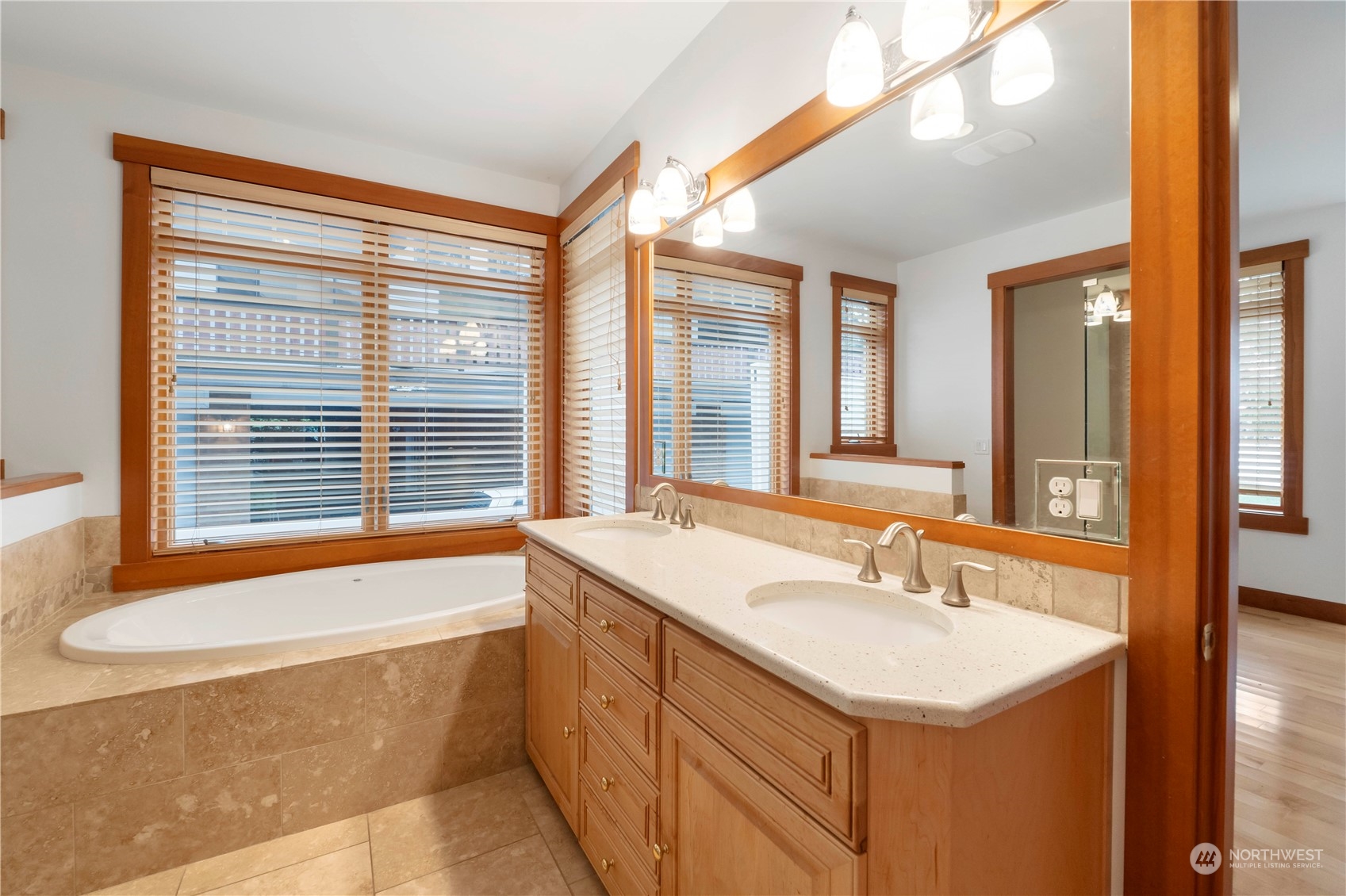 73 Raft Island Drive Northwest Gig Harbor, WA 98335 - Photo 22 of 40 a bathroom with a sink and a bathtub