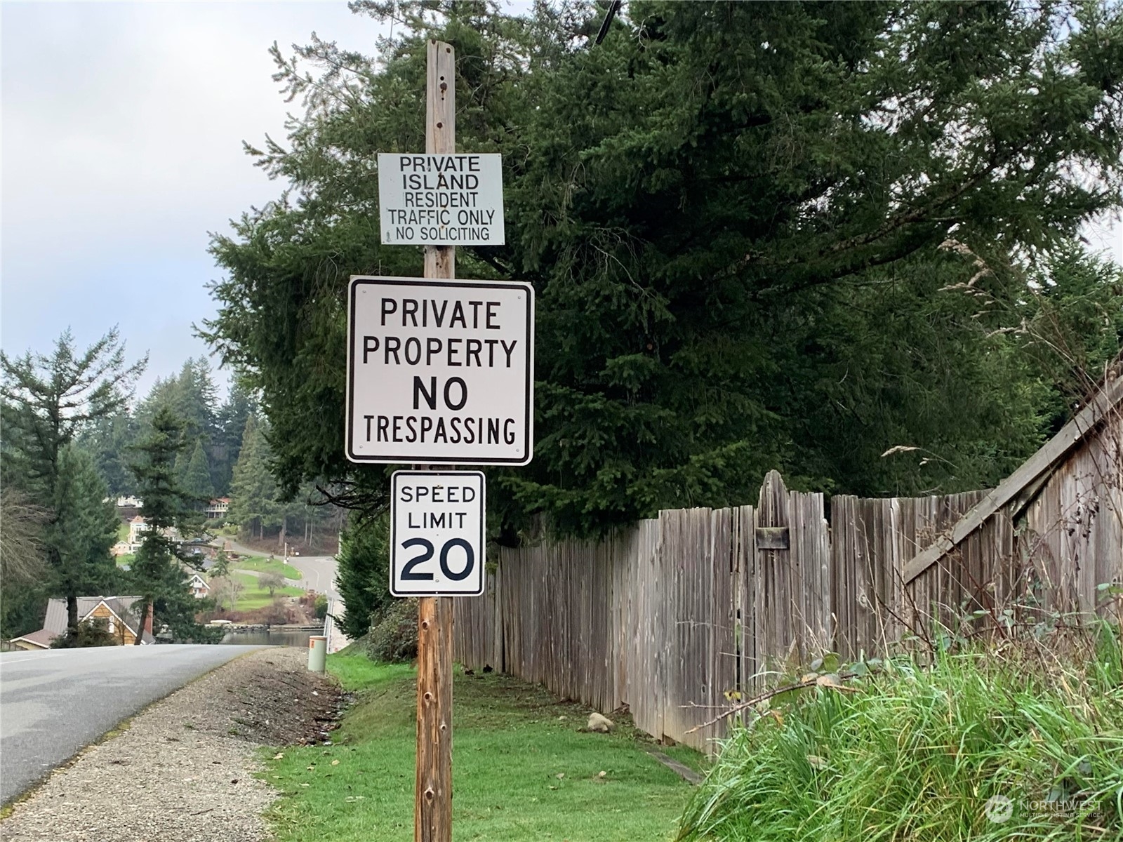 73 Raft Island Drive Northwest Gig Harbor, WA 98335 - Photo 36 of 40 a sign on the side of the road