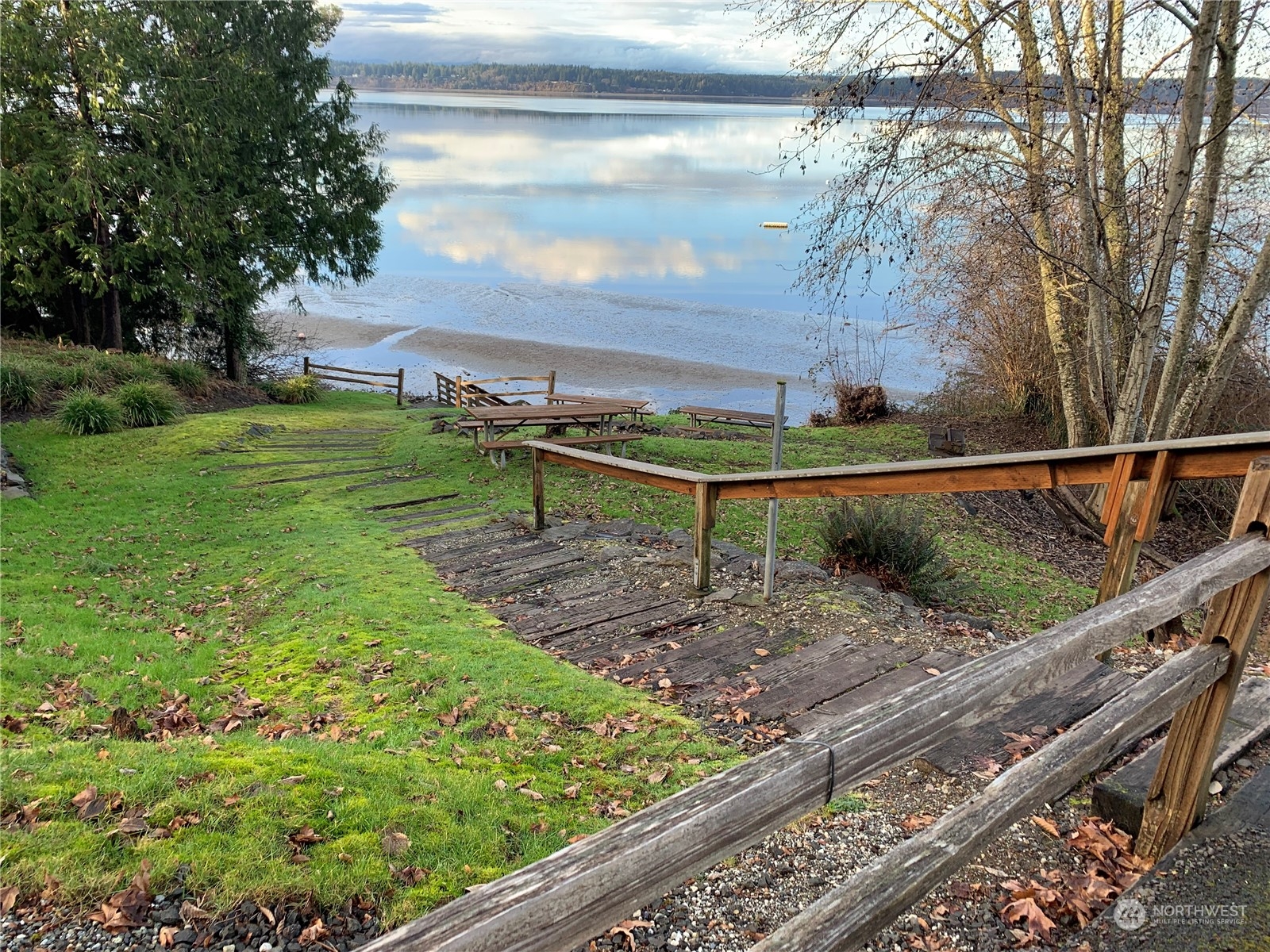 73 Raft Island Drive Northwest Gig Harbor, WA 98335 - Photo 40 of 40 a view of a garden with a tree in the background