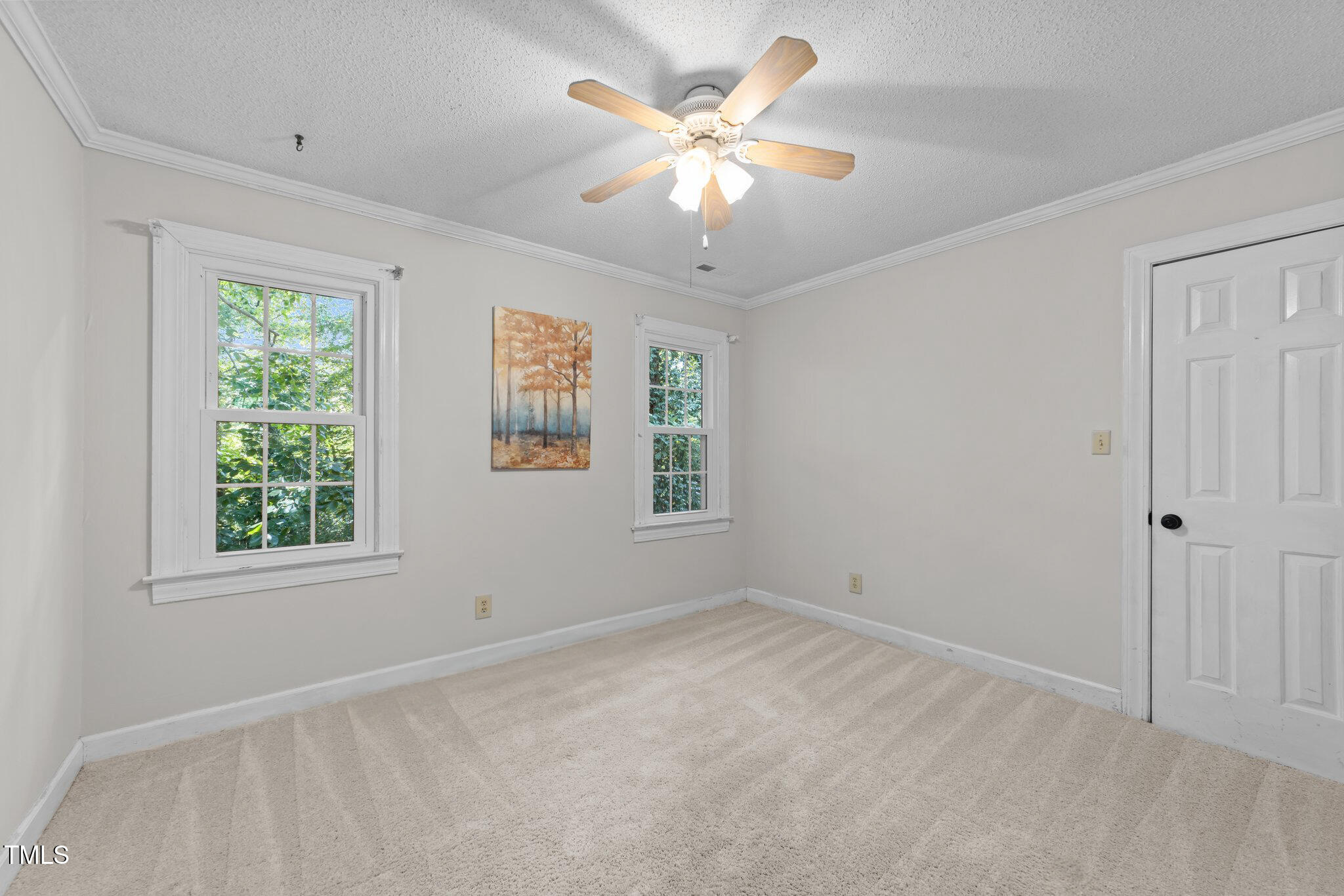 2840 Mattlyn Court Raleigh, NC 27613 - Photo 23 of 42 a view of an empty room with a window