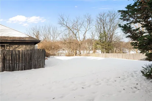 a street view with wooden fence