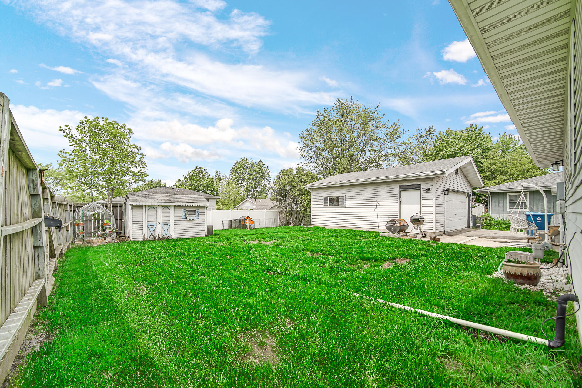 110 Beech Court Hebron, IN 46341 - Photo 17 of 18 a view of backyard of house with green space
