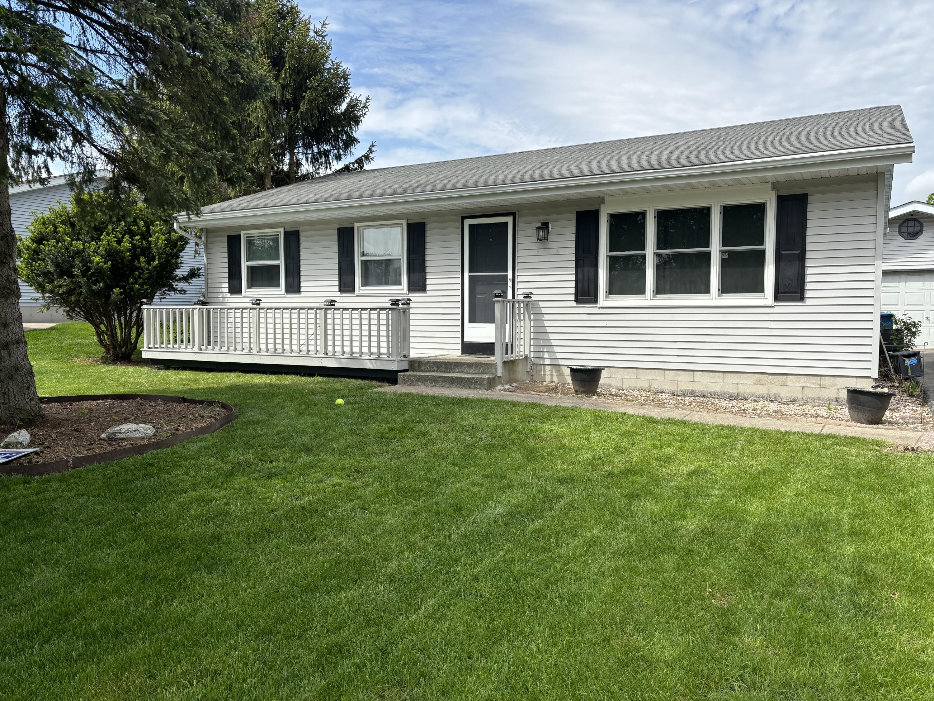 110 Beech Court Hebron, IN 46341 - Photo 2 of 18 a view of a house with a yard