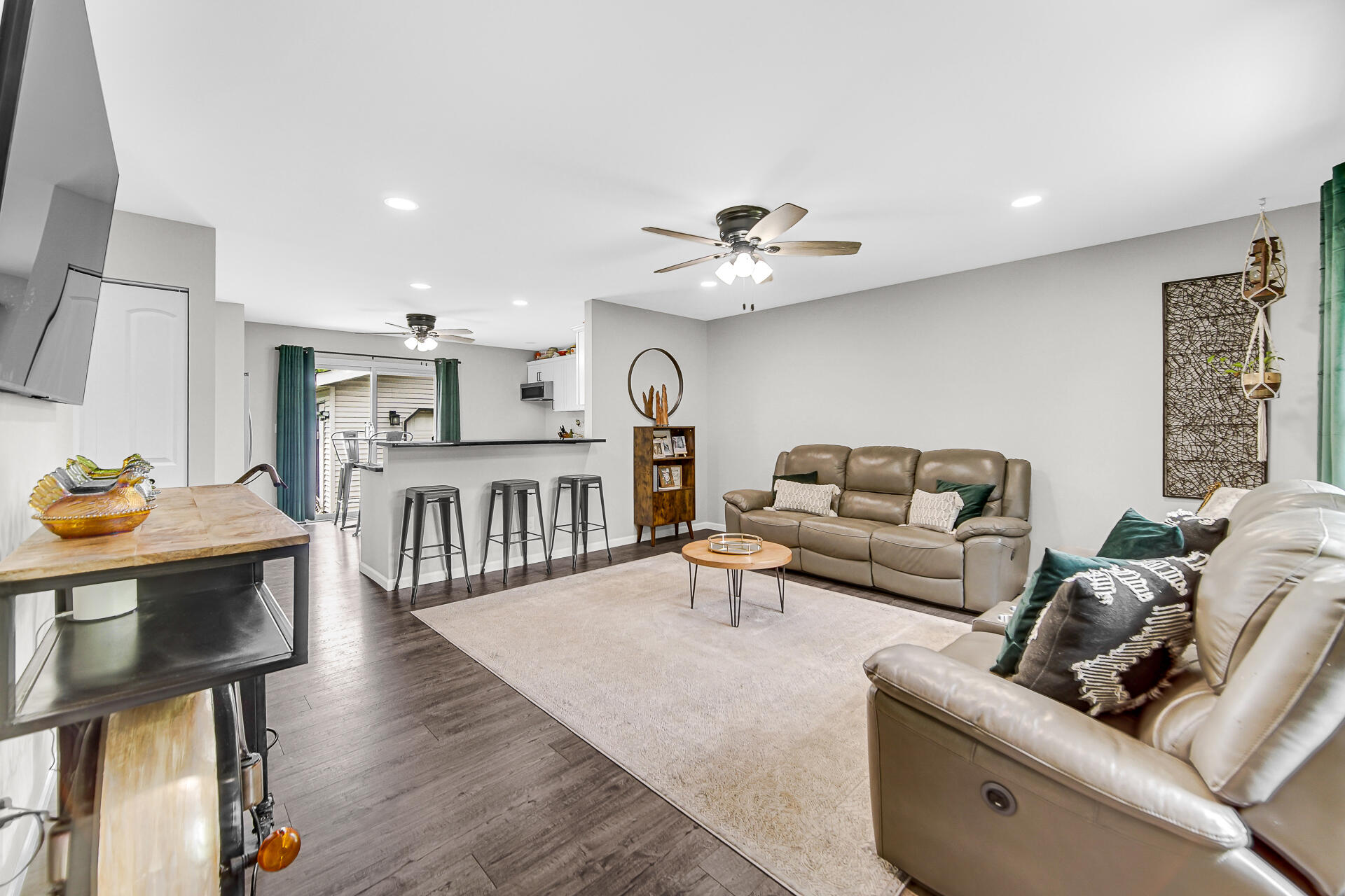 110 Beech Court Hebron, IN 46341 - Photo 5 of 18 a living room with furniture and a wooden floor