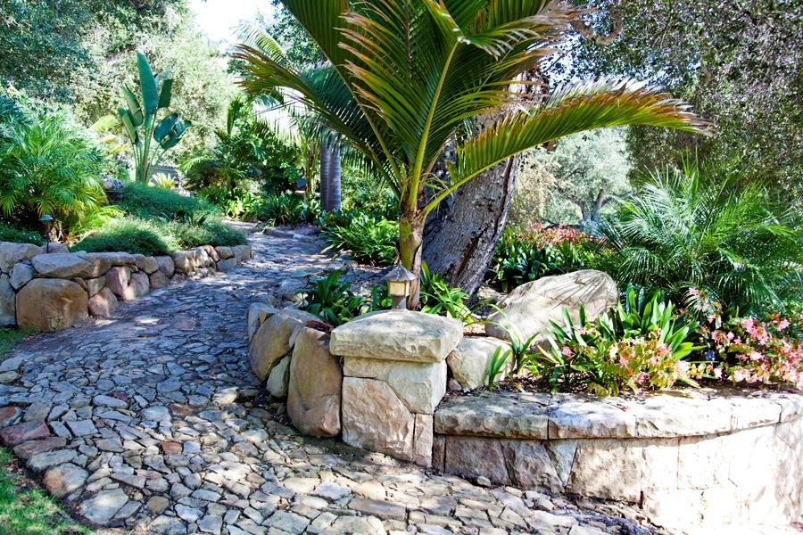455 Toro Canyon Road Montecito, CA 93108 - Photo 4 of 17 a wooden bench with some plants
