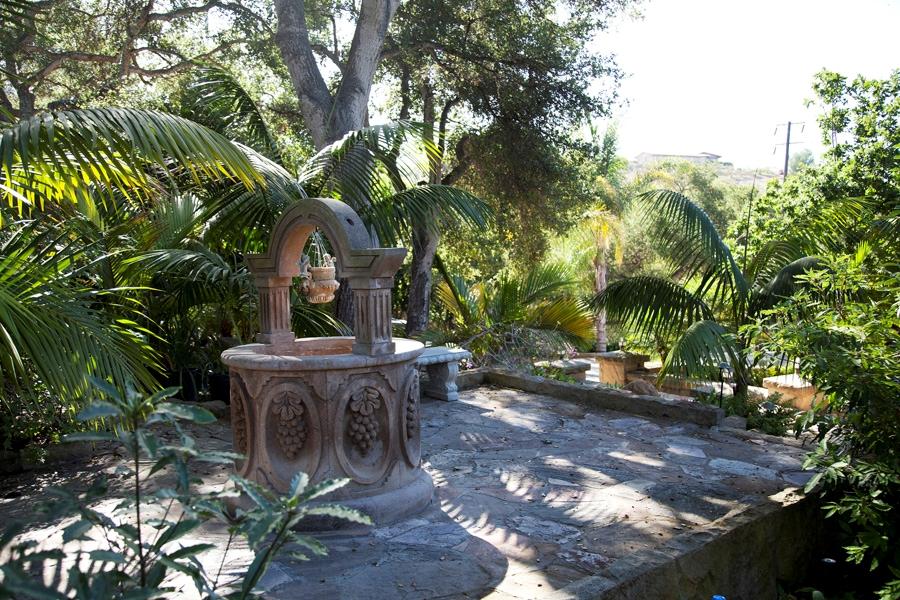 455 Toro Canyon Road Montecito, CA 93108 - Photo 7 of 17 a view of a table and chairs in a backyard