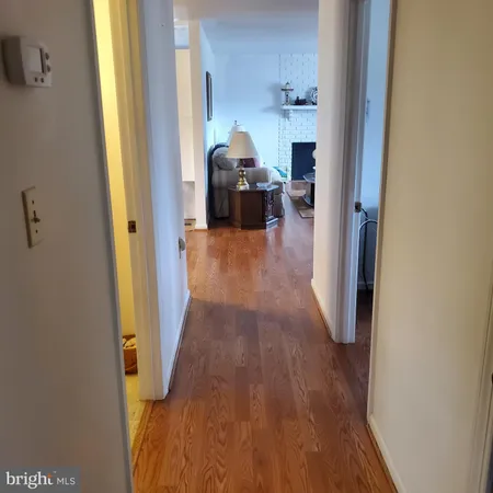 a way to rooms with wooden floor