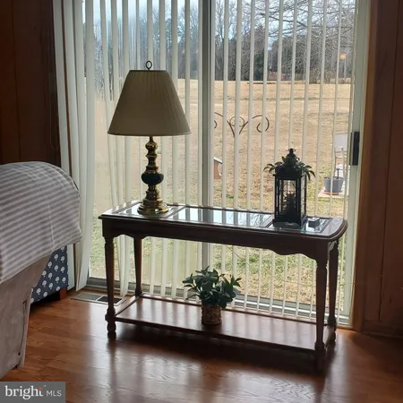 a view of a balcony with chairs