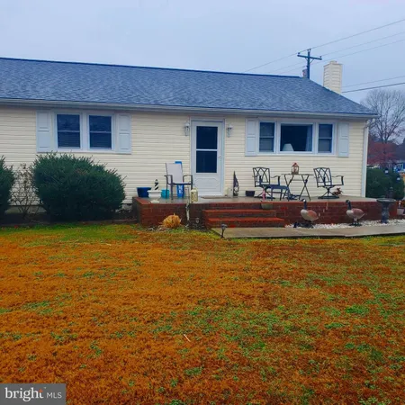 a front view of house with ocean view