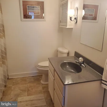 a bathroom with a sink and a toilet