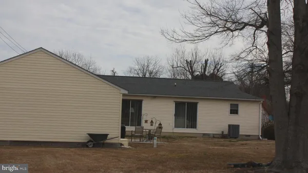 a house view with a backyard space