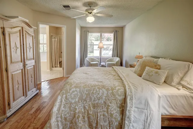 a bathroom with a tub and shower