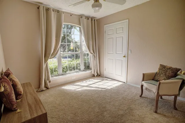 a room with furniture and window