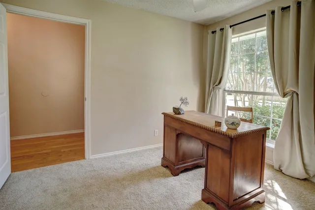 a room with furniture and a window