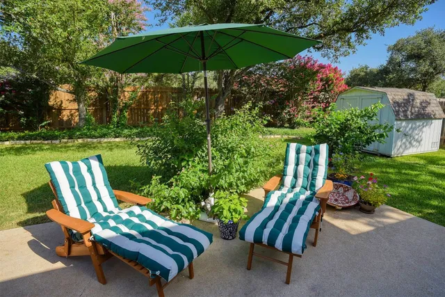 a garden view with a seating space