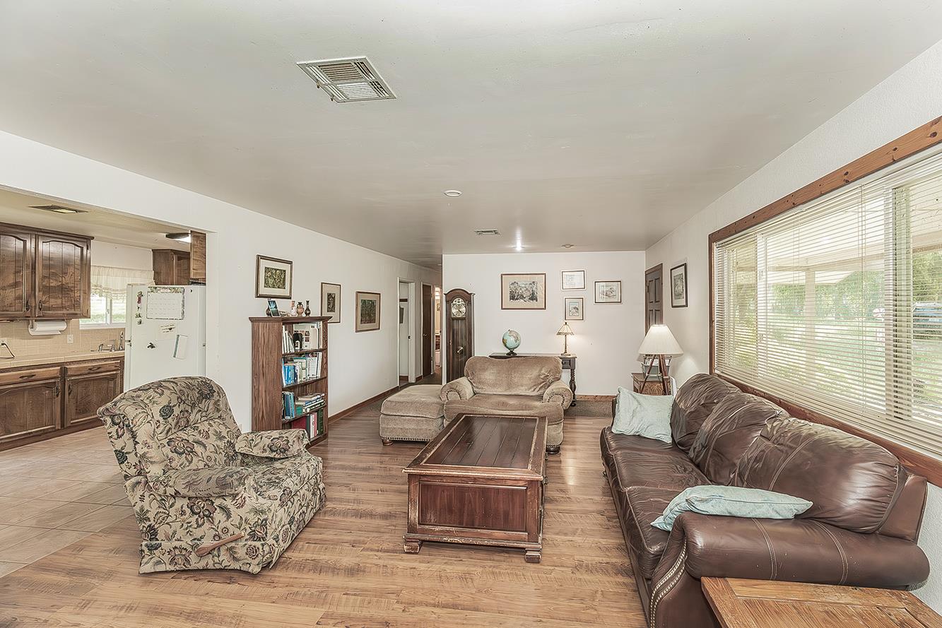 26045 Pittman Hill Road Clovis, CA 93619 - Photo 15 of 93 a living room with furniture and a large window