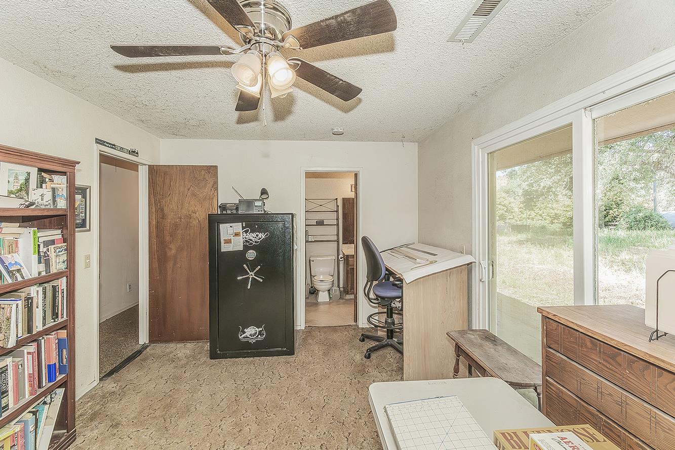 26045 Pittman Hill Road Clovis, CA 93619 - Photo 32 of 93 a view of a livingroom with furniture and window